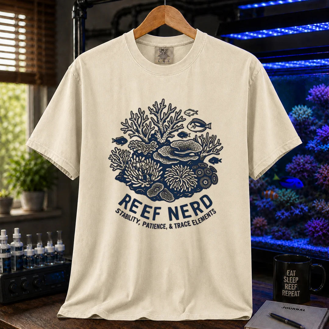 Saltwater aquarium graphic t-shirt featuring a detailed coral reef illustration with text: REEF NERD STABILITY, PATIENCE, & TRACE ELEMENTS, cream, beige, ivory crew neck tee
