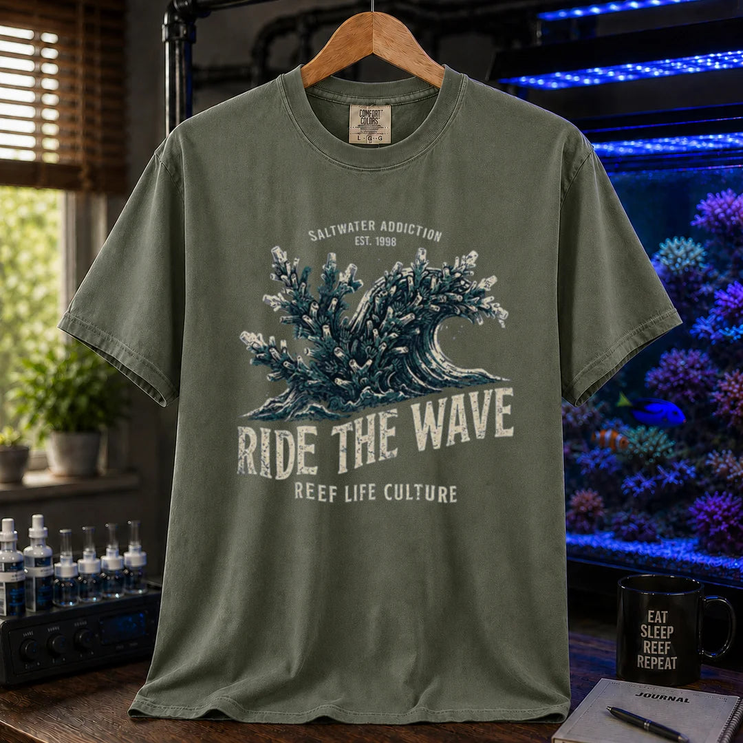 Saltwater aquarium graphic t-shirt featuring a vintage ocean wave made of coral and text: SALTWATER ADDICTION RIDE THE WAVE REEF LIFE CULTURE, military green crew neck tee
