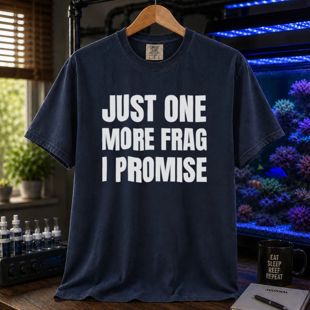 Saltwater aquarium graphic t-shirt featuring bold block text: JUST ONE MORE FRAG I PROMISE, navy crew neck tee