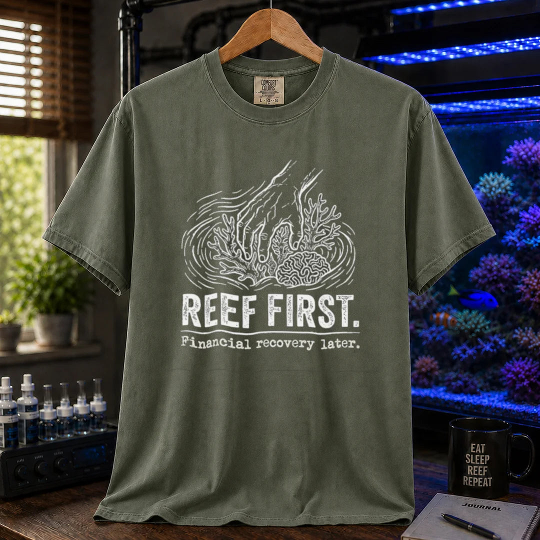 Saltwater aquarium graphic t-shirt featuring a hand tending corals illustration and text: REEF FIRST. Financial recovery later., military green crew neck tee
