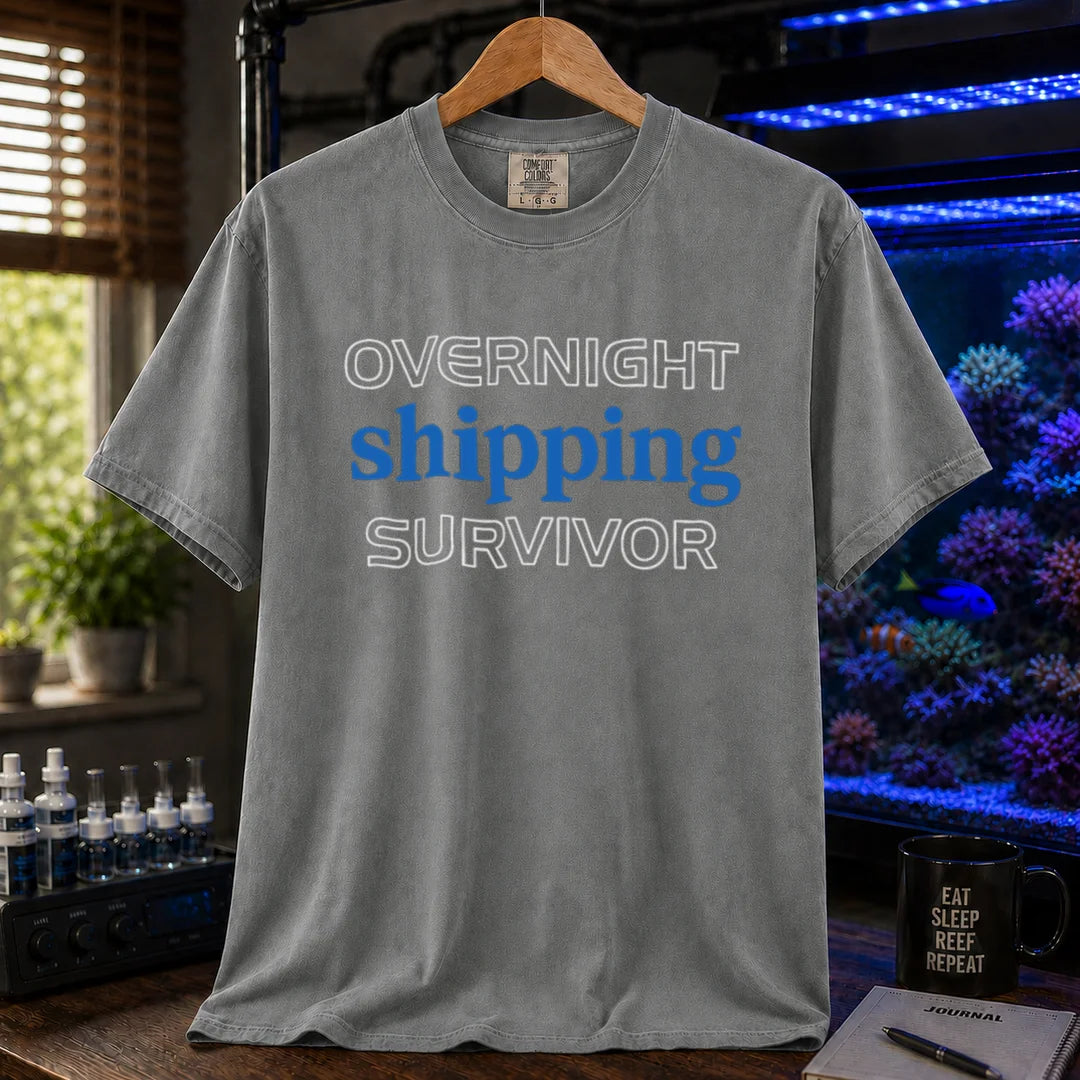 Saltwater aquarium graphic t-shirt featuring outline and solid text: OVERNIGHT shipping SURVIVOR, grey crew neck tee
