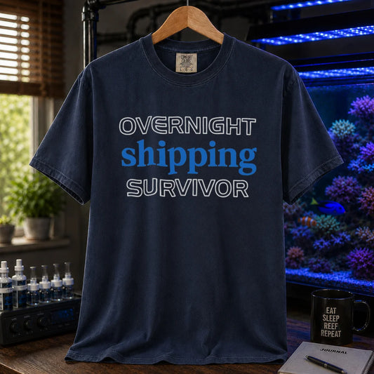 Saltwater aquarium graphic t-shirt featuring outline and solid text: OVERNIGHT shipping SURVIVOR, navy crew neck tee