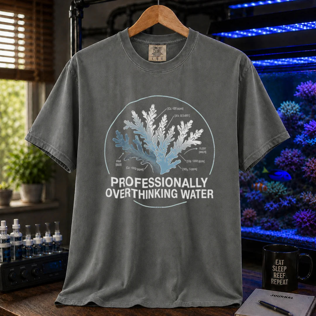 Saltwater aquarium graphic t-shirt featuring a scientific coral diagram with water parameters and text: PROFESSIONALLY OVERTHINKING WATER, dark grey crew neck tee