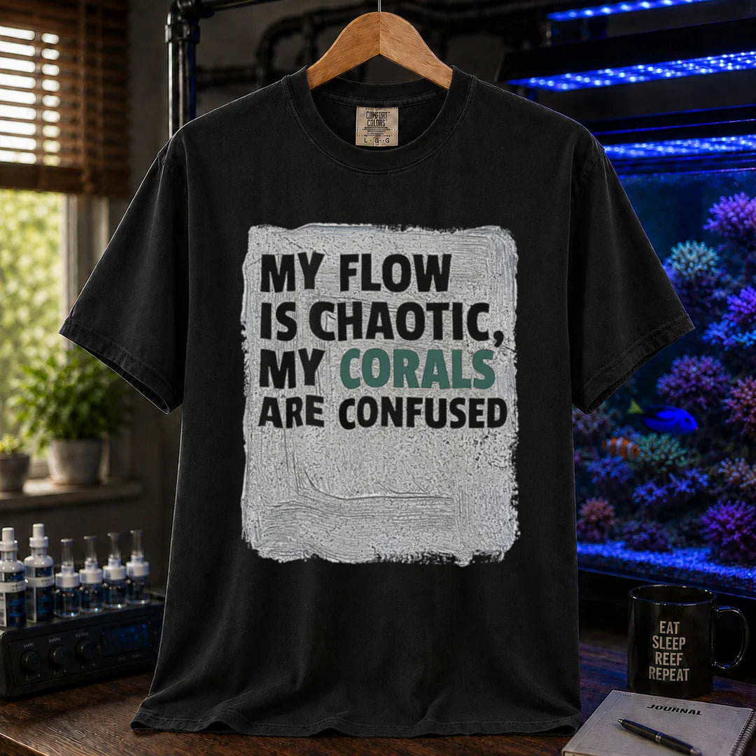 Saltwater aquarium graphic t-shirt featuring distressed brushstroke background and text: MY FLOW IS CHAOTIC, MY CORALS ARE CONFUSED, black crew neck tee
