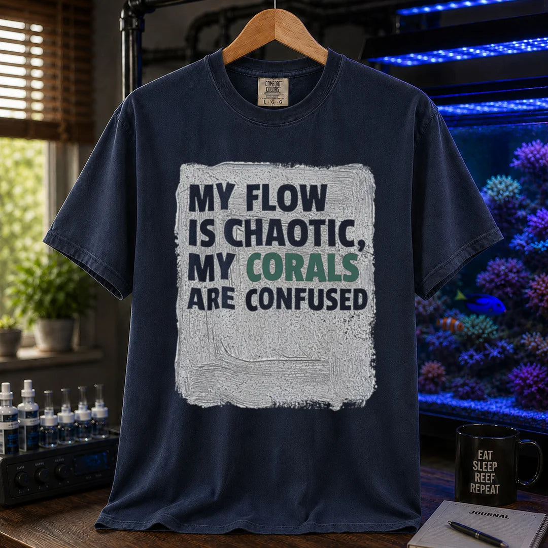 Saltwater aquarium graphic t-shirt featuring distressed brushstroke background and text: MY FLOW IS CHAOTIC, MY CORALS ARE CONFUSED, navy crew neck tee