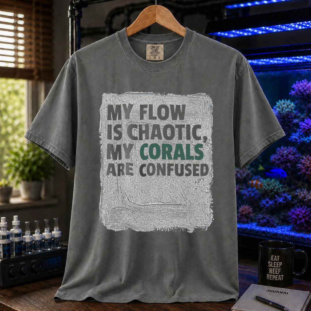 Saltwater aquarium graphic t-shirt featuring distressed brushstroke background and text: MY FLOW IS CHAOTIC, MY CORALS ARE CONFUSED, dark grey crew neck tee