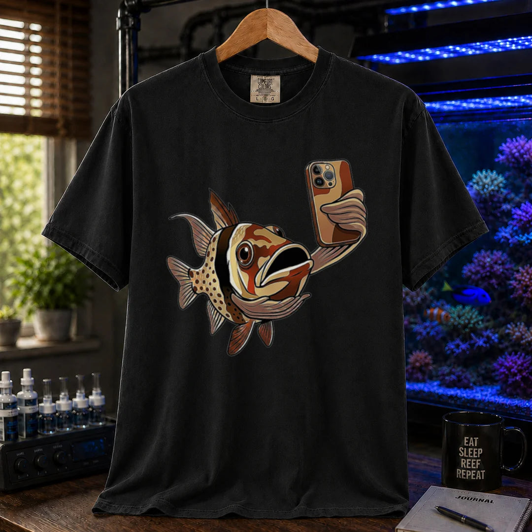 Saltwater aquarium graphic t-shirt featuring a pajama cardinalfish taking a selfie with a smartphone, black crew neck tee