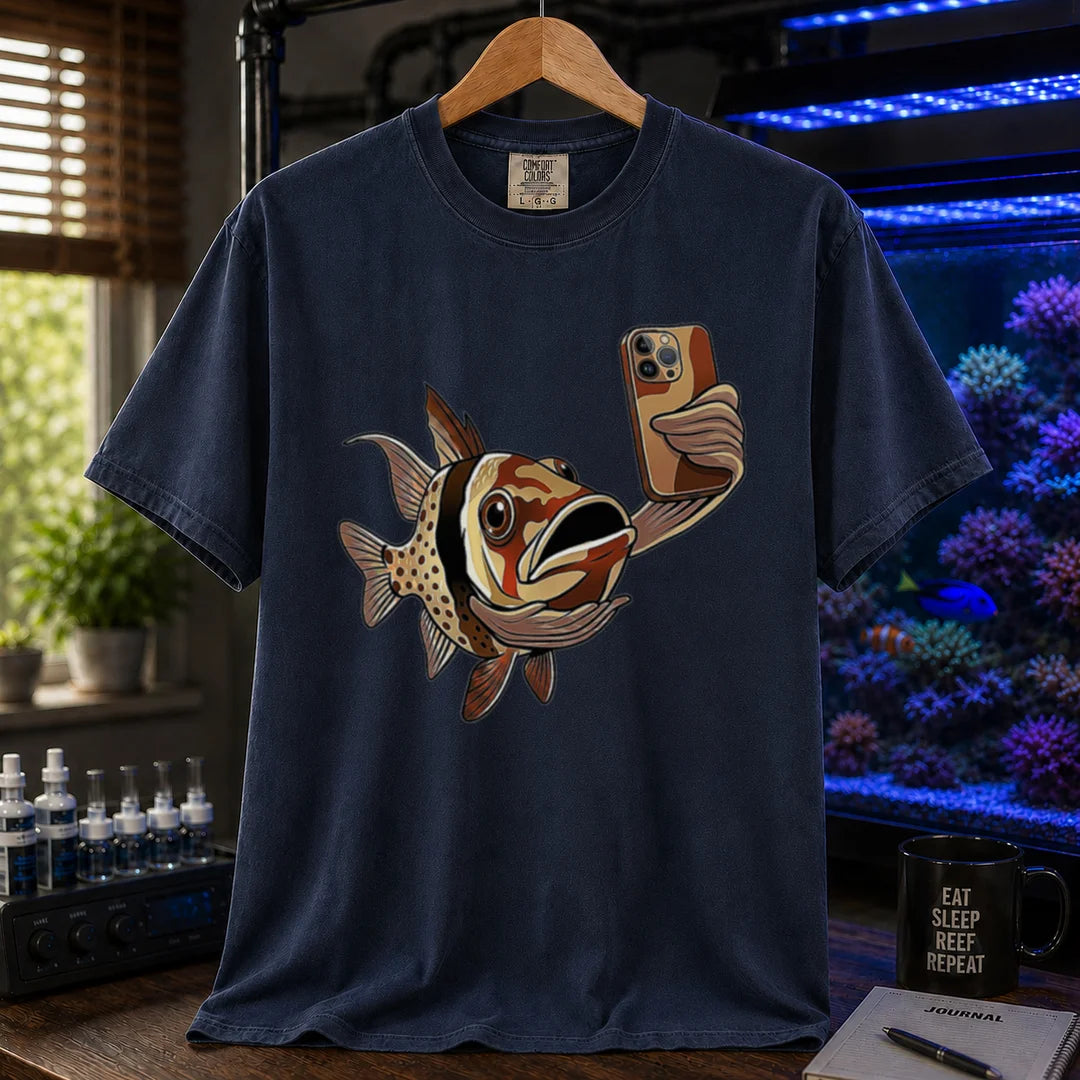 Saltwater aquarium graphic t-shirt featuring a pajama cardinalfish taking a selfie with a smartphone, navy crew neck tee