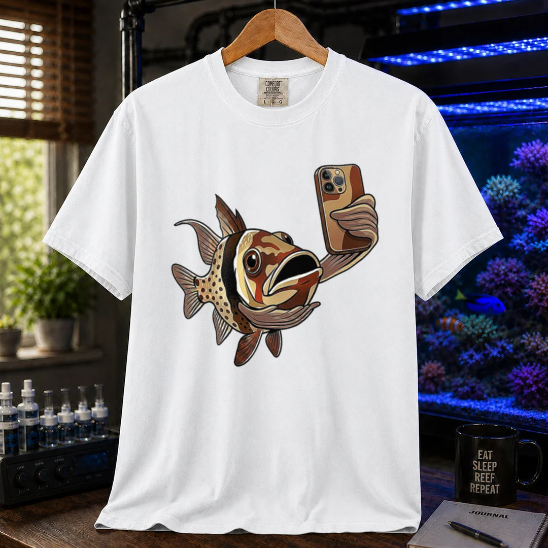 Saltwater aquarium graphic t-shirt featuring a pajama cardinalfish taking a selfie with a smartphone, white crew neck tee