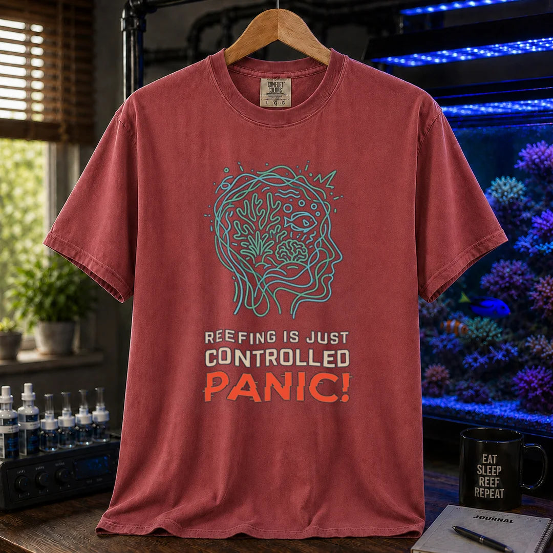 Saltwater aquarium graphic t-shirt featuring a brain/reef head outline illustration and text: REEFING IS JUST CONTROLLED PANIC!, maroon, red crew neck tee
