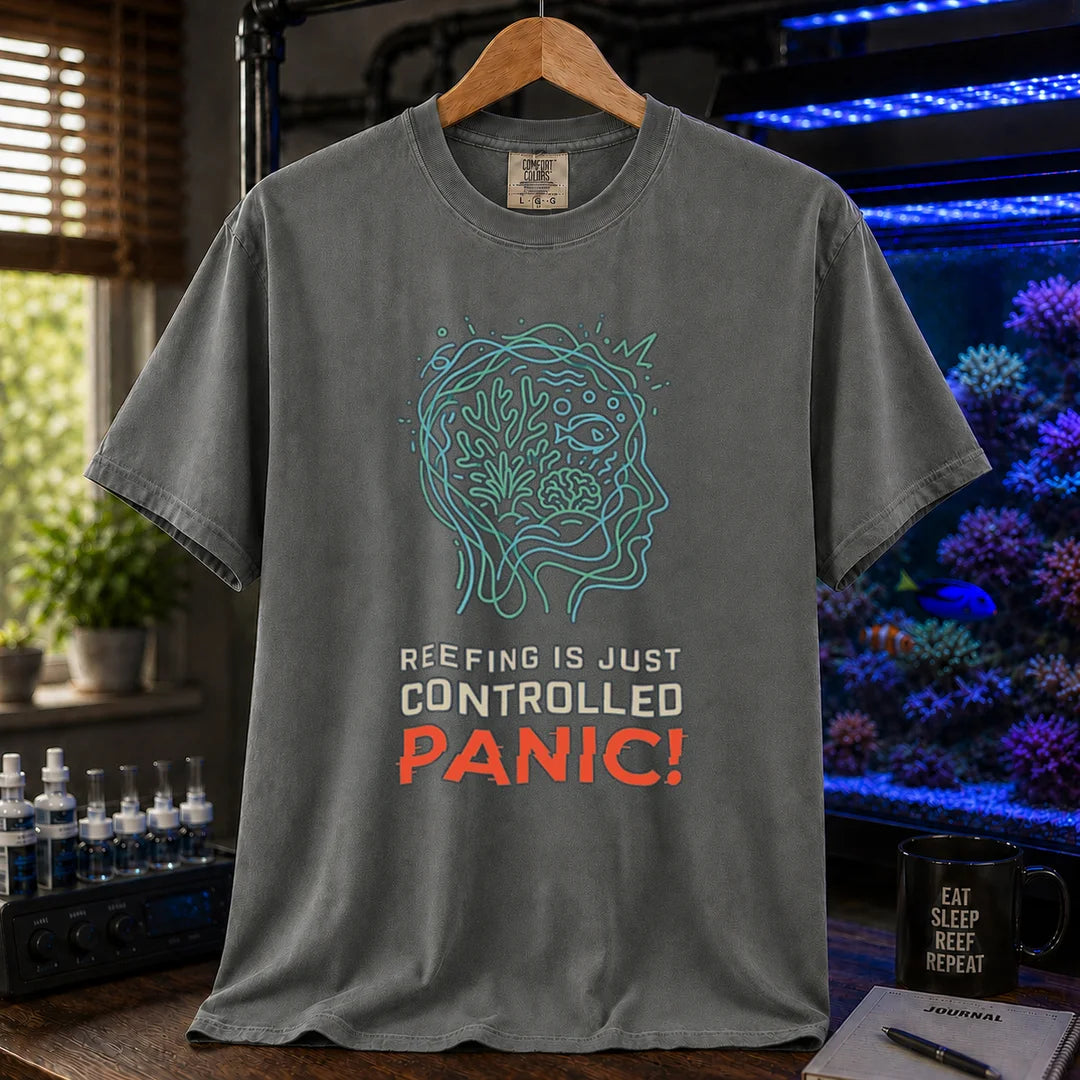 Saltwater aquarium graphic t-shirt featuring a brain/reef head outline illustration and text: REEFING IS JUST CONTROLLED PANIC!, dark grey crew neck tee