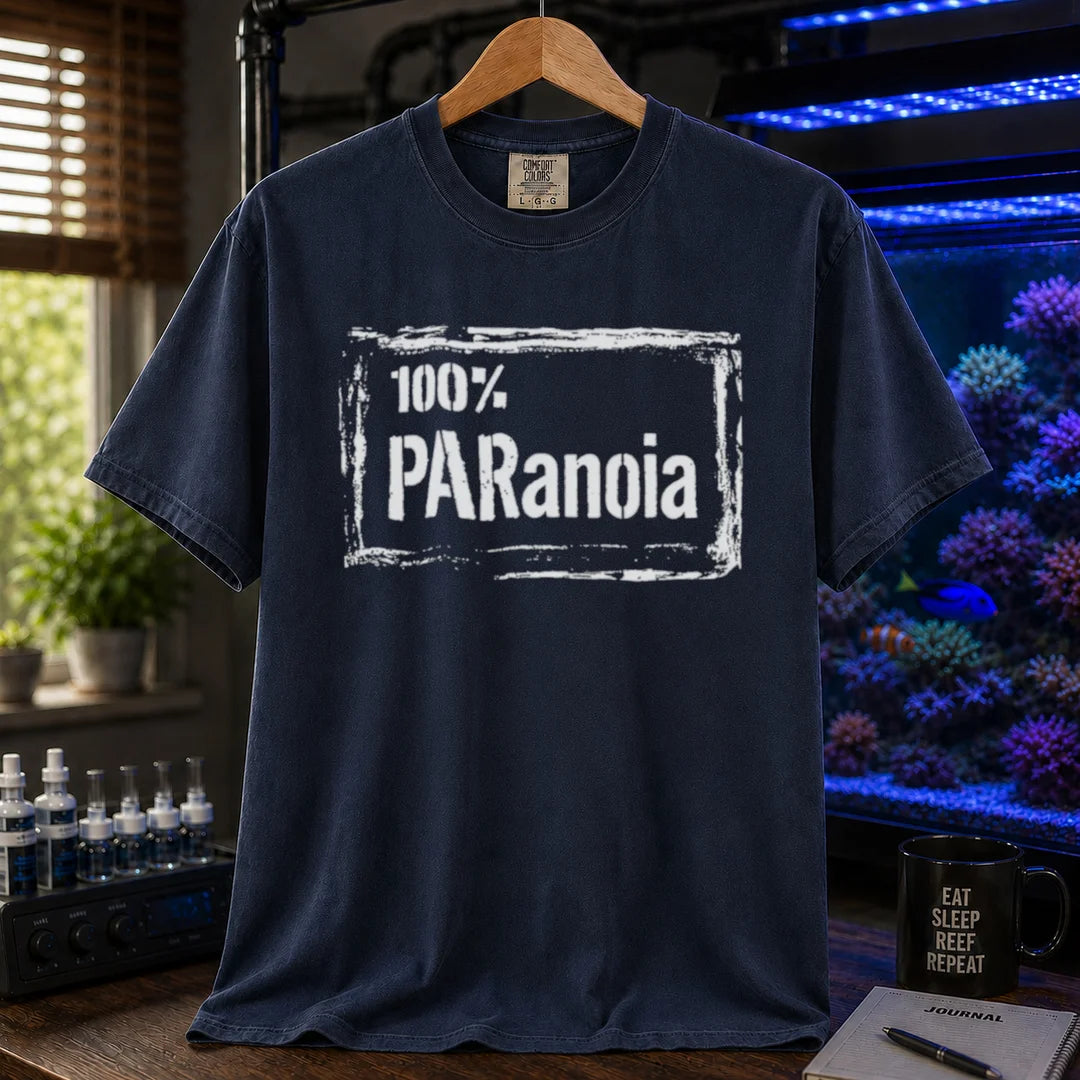 Saltwater aquarium graphic t-shirt featuring a distressed box frame and text: 100% PARANOIA, navy crew neck tee