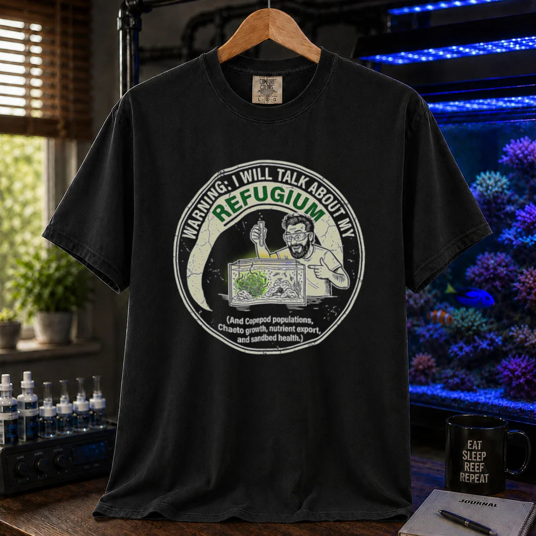 Saltwater aquarium graphic t-shirt featuring an illustration of an aquarist tending a refugium with text: WARNING: I WILL TALK ABOUT MY REFUGIUM (And Copepod populations, Chaeto growth, nutrient export, and sandbed health.), black crew neck tee