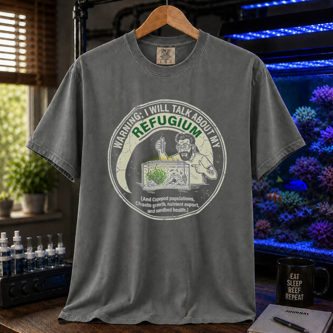 Saltwater aquarium graphic t-shirt featuring an illustration of an aquarist tending a refugium with text: WARNING: I WILL TALK ABOUT MY REFUGIUM (And Copepod populations, Chaeto growth, nutrient export, and sandbed health.), grey crew neck tee