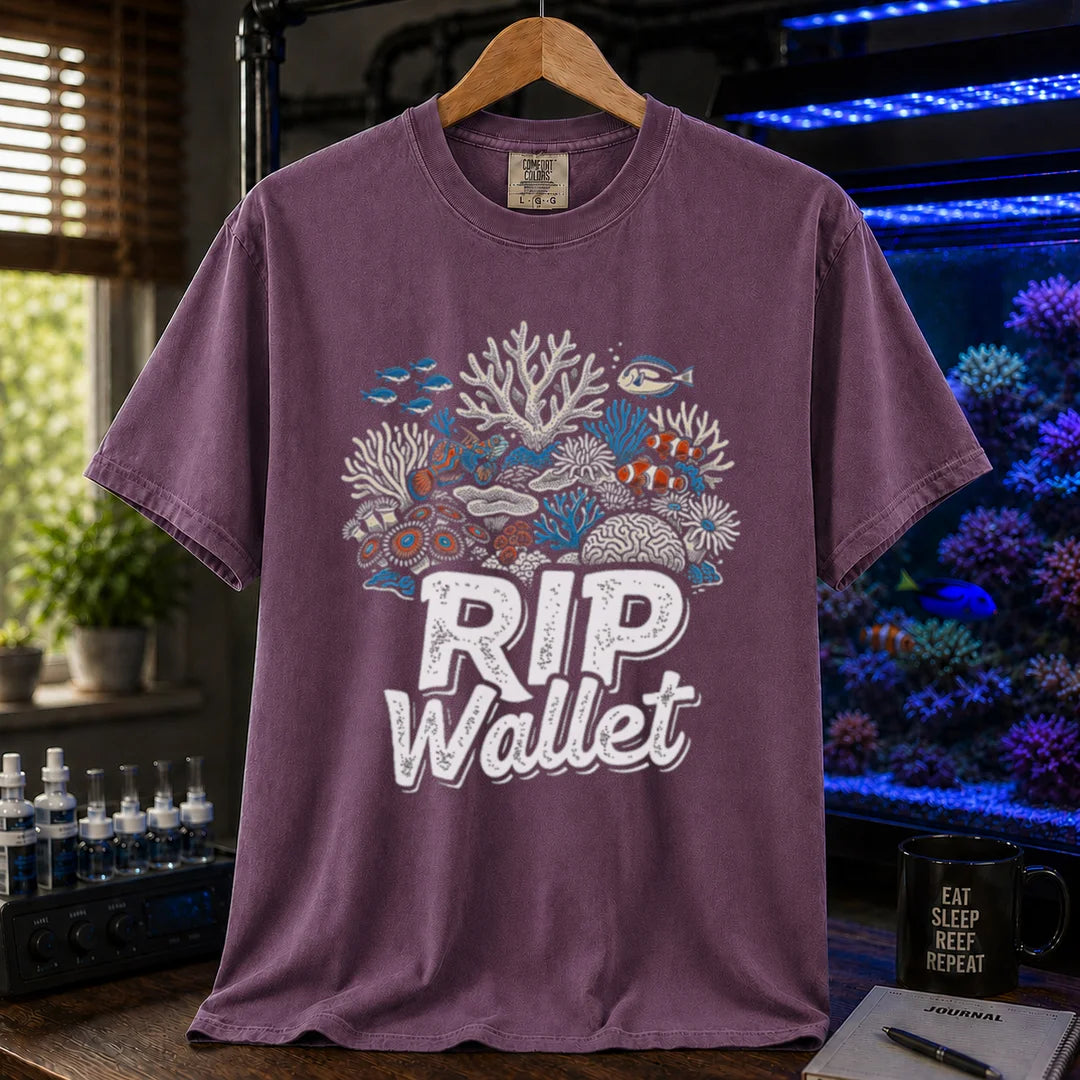 Saltwater aquarium graphic t-shirt featuring a detailed coral reef illustration and text reading RIP Wallet, purple crew neck tee