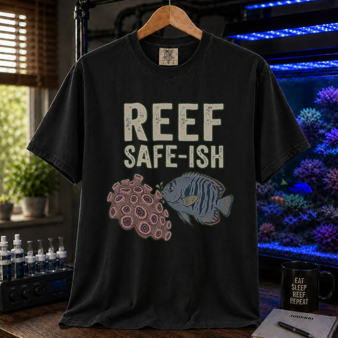 Saltwater aquarium graphic t-shirt featuring a fish nibbling coral illustration with text: REEF SAFE-ISH, black crew neck tee