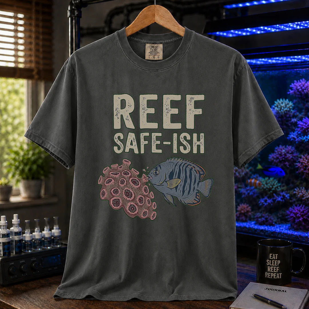 Saltwater aquarium graphic t-shirt featuring a fish nibbling coral illustration with text: REEF SAFE-ISH, dark grey crew neck tee