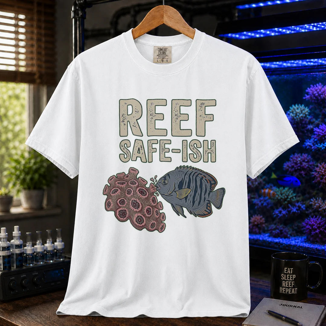 Saltwater aquarium graphic t-shirt featuring a fish nibbling coral illustration with text: REEF SAFE-ISH, white crew neck tee