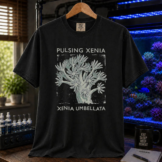 Saltwater aquarium graphic t-shirt featuring a Pulsing Xenia coral illustration with text: PULSING XENIA XENIA UMBELLATA, black crew neck tee