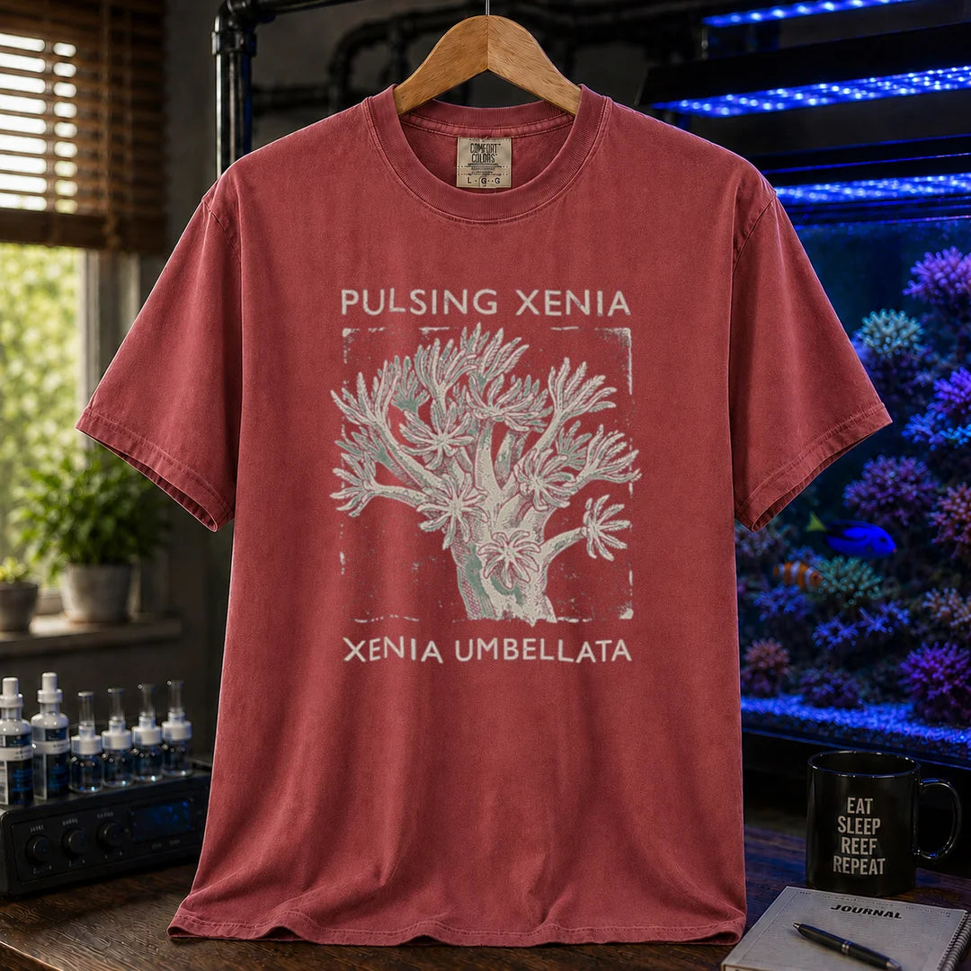 Saltwater aquarium graphic t-shirt featuring a Pulsing Xenia coral illustration with text: PULSING XENIA XENIA UMBELLATA, maroon, red crew neck tee