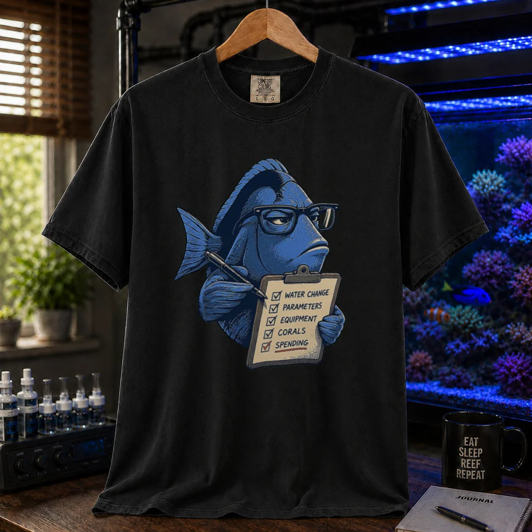 Saltwater aquarium graphic t-shirt featuring a blue tang with glasses holding a maintenance clipboard, black crew neck tee