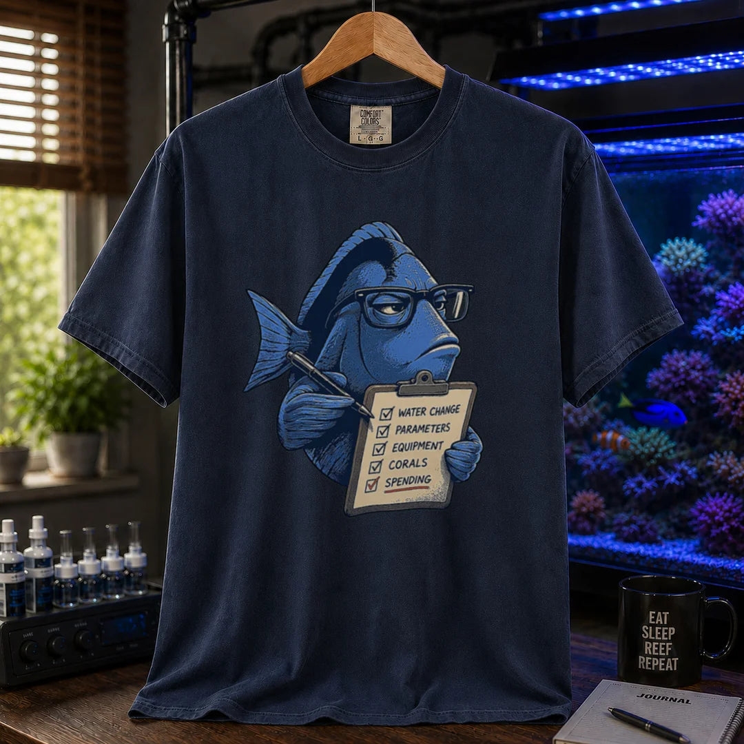 Saltwater aquarium graphic t-shirt featuring a blue tang with glasses holding a maintenance clipboard, navy crew neck tee