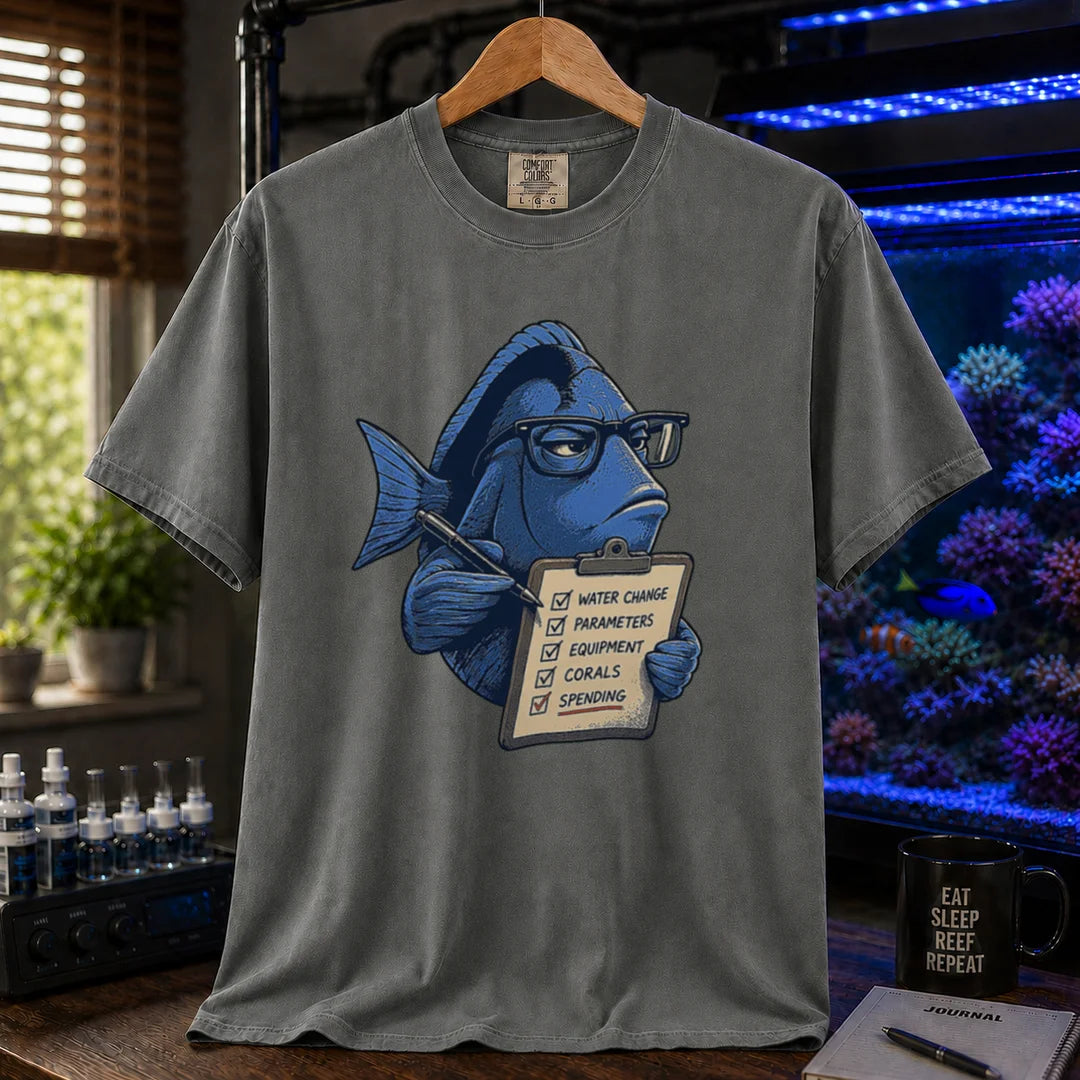 Saltwater aquarium graphic t-shirt featuring a blue tang with glasses holding a maintenance clipboard, dark grey crew neck tee