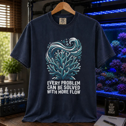 Saltwater aquarium graphic t-shirt featuring a swirling water current and coral illustration with text: EVERY PROBLEM CAN BE SOLVED WITH MORE FLOW, navy crew neck tee