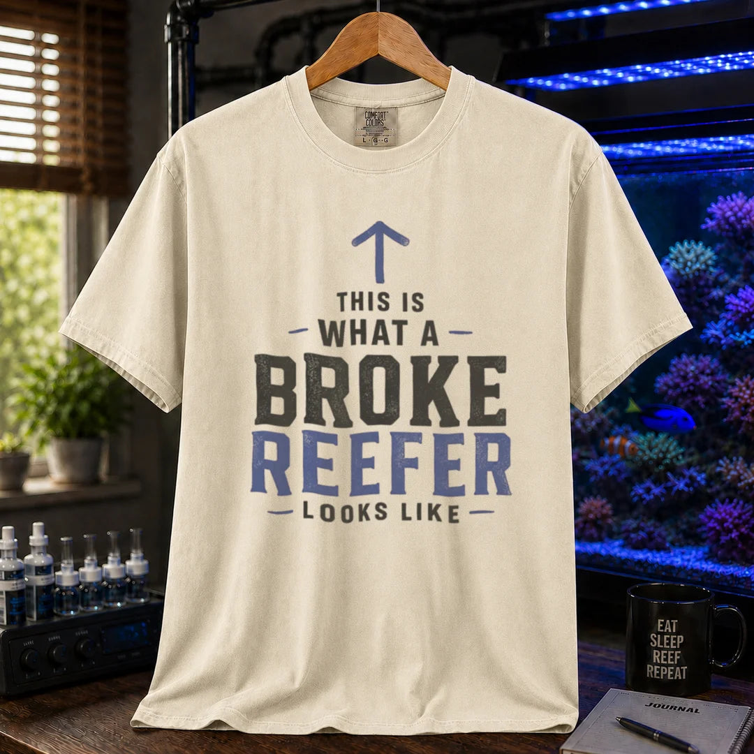 Saltwater aquarium graphic t-shirt featuring an upward arrow and bold text: THIS IS WHAT A BROKE REEFER LOOKS LIKE, cream, beige, ivory crew neck tee