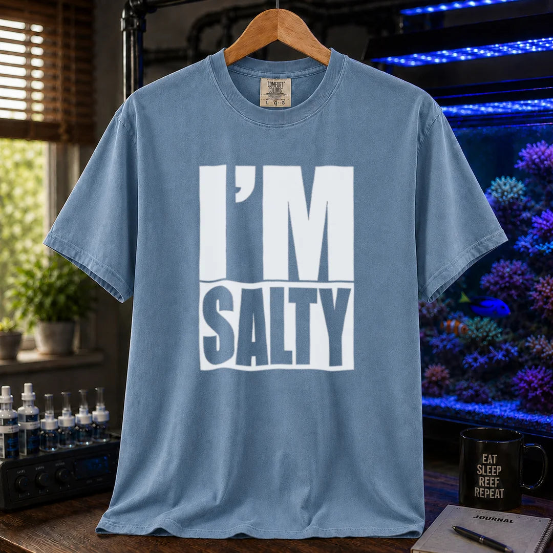 Saltwater aquarium graphic t-shirt featuring bold block text: I'M SALTY with a water line, blue crew neck tee