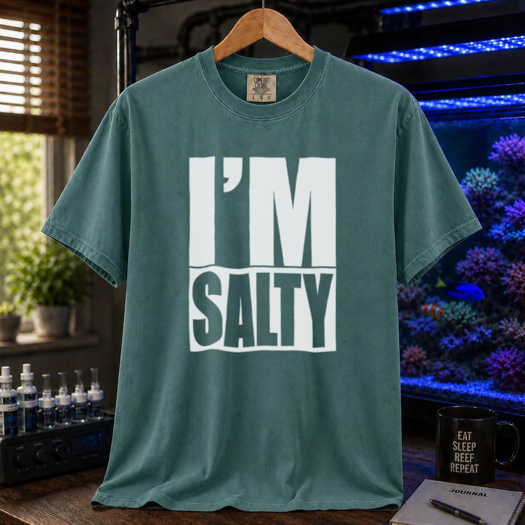 Saltwater aquarium graphic t-shirt featuring bold block text: I'M SALTY with a water line, green crew neck tee