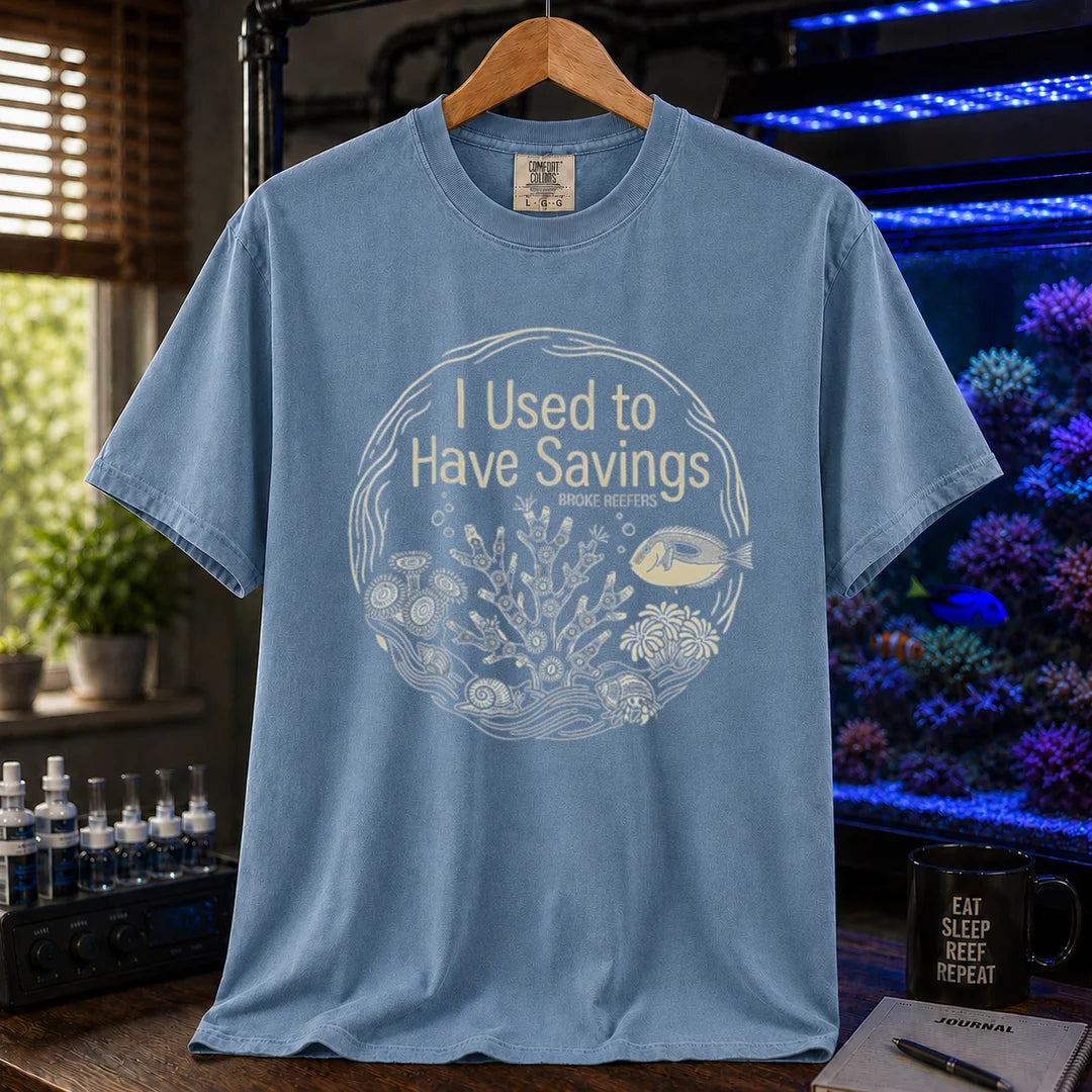 Saltwater aquarium graphic t-shirt featuring a circular reef illustration and text: I Used to Have Savings BROKE REEFERS, blue crew neck tee