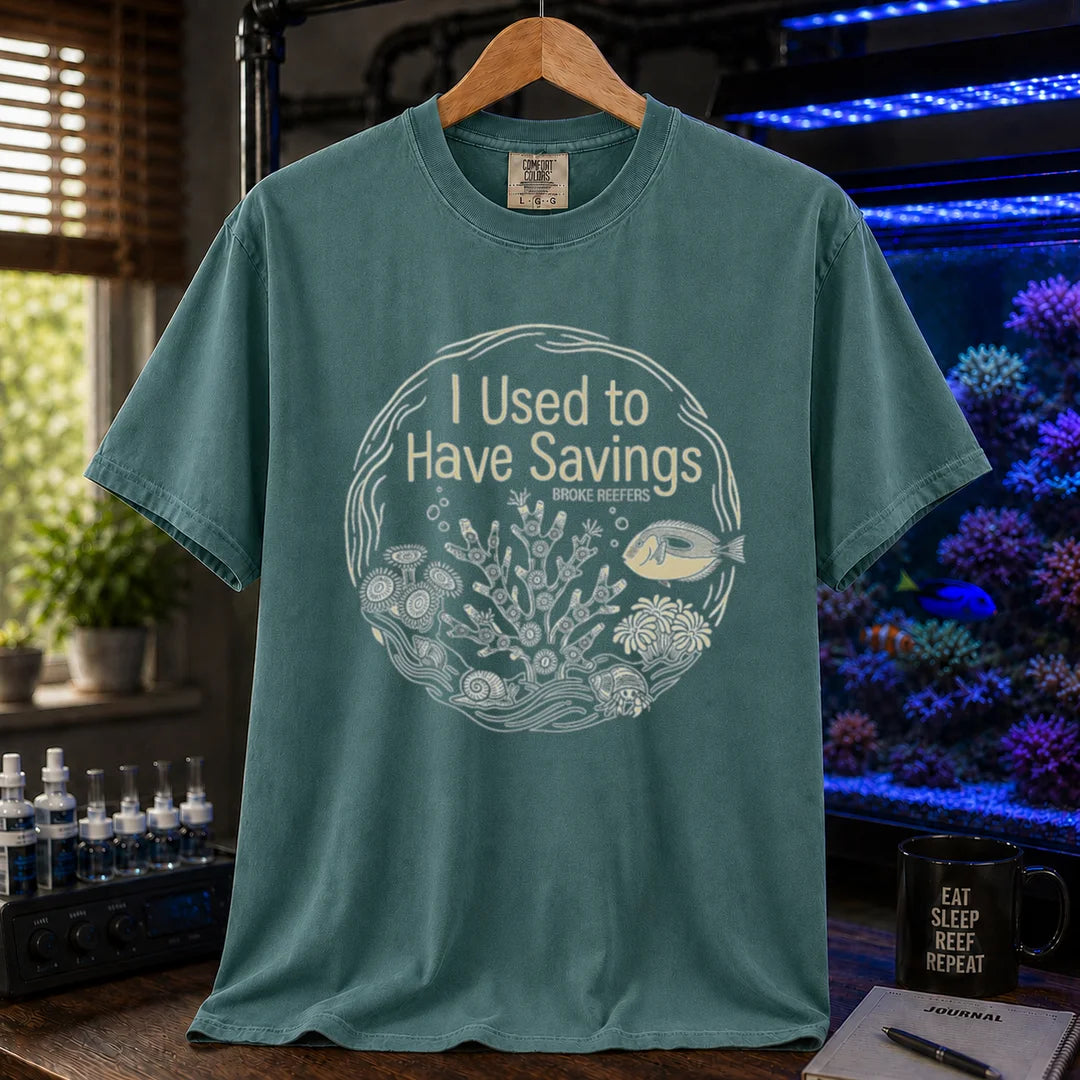 Saltwater aquarium graphic t-shirt featuring a circular reef illustration and text: I Used to Have Savings BROKE REEFERS, green crew neck tee
