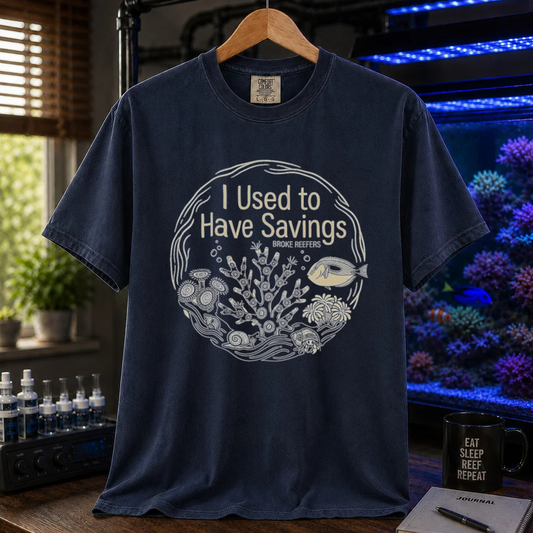 Saltwater aquarium graphic t-shirt featuring a circular reef illustration and text: I Used to Have Savings BROKE REEFERS, navy crew neck tee