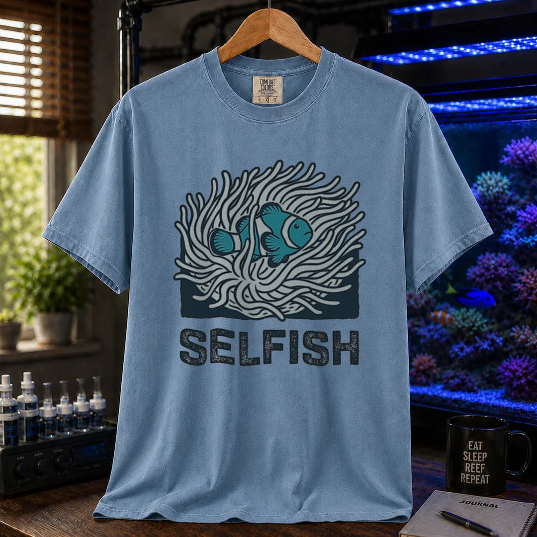 Saltwater aquarium graphic t-shirt featuring a clownfish in an anemone illustration and text: SELFISH, blue crew neck tee