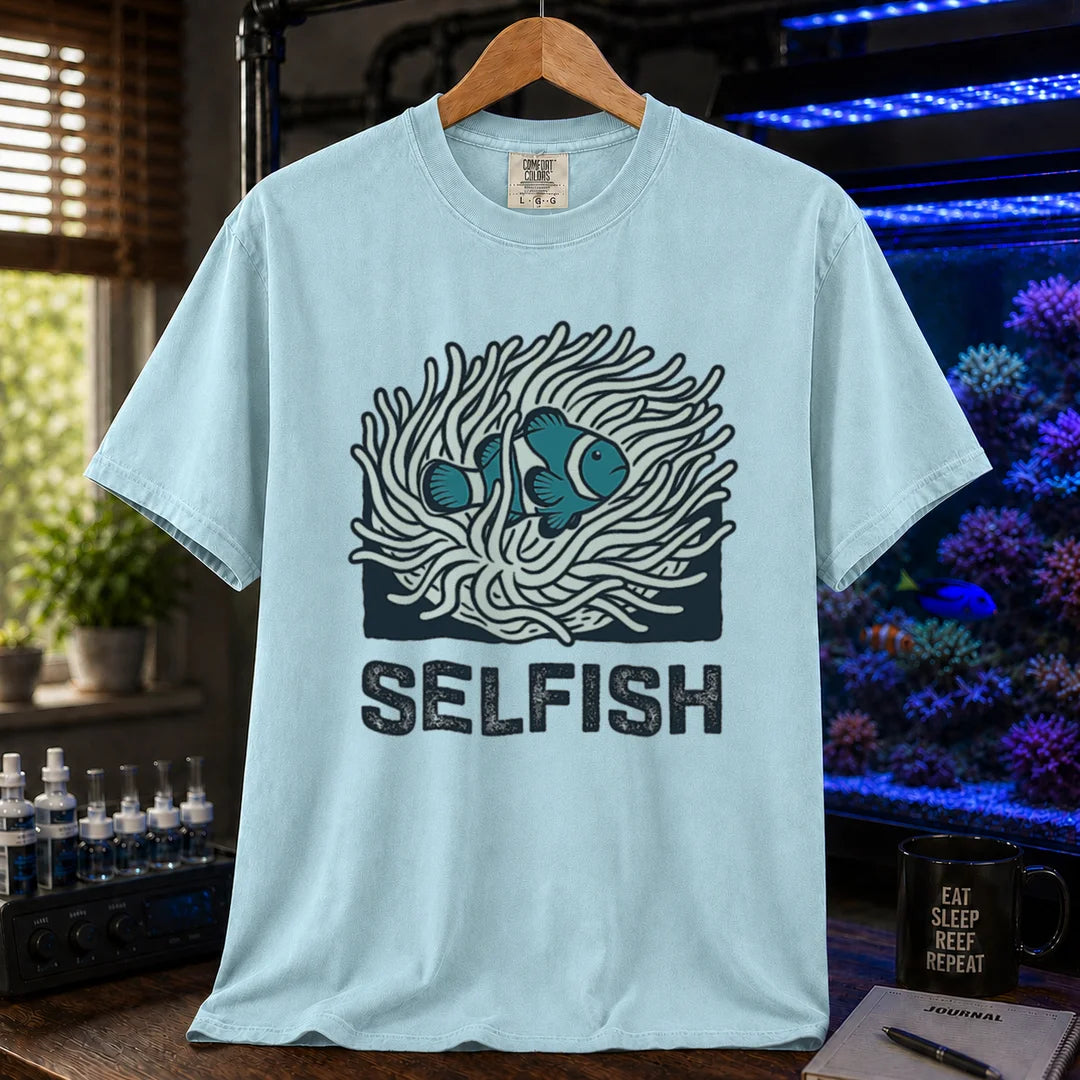 Saltwater aquarium graphic t-shirt featuring a clownfish in an anemone illustration and text: SELFISH, light blue crew neck tee