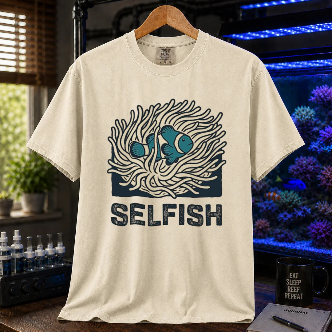 Saltwater aquarium graphic t-shirt featuring a clownfish in an anemone illustration and text: SELFISH, cream, beige, ivory crew neck tee 