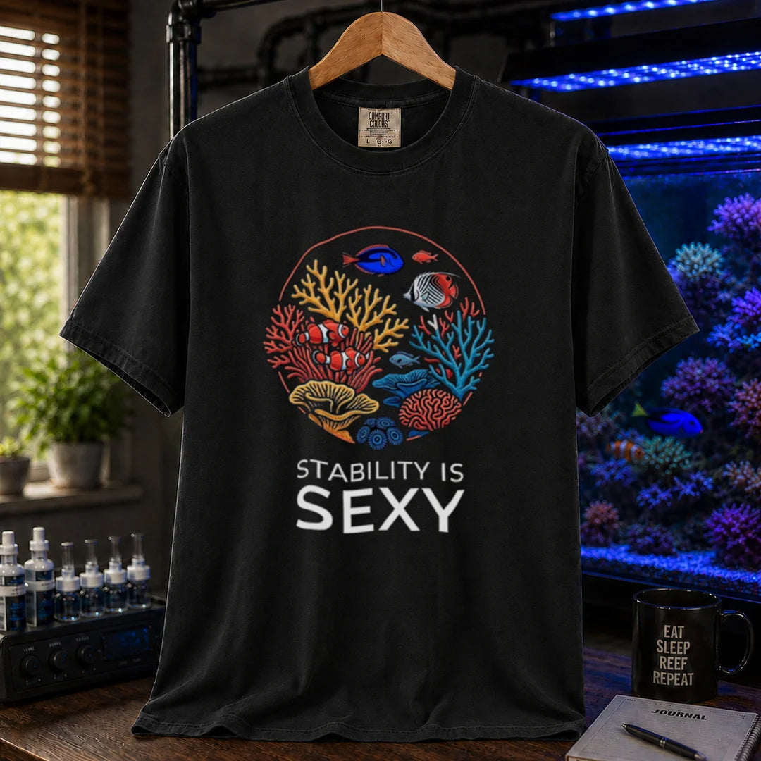Saltwater aquarium graphic t-shirt featuring a circular coral reef illustration and text: STABILITY IS SEXY, black crew neck tee