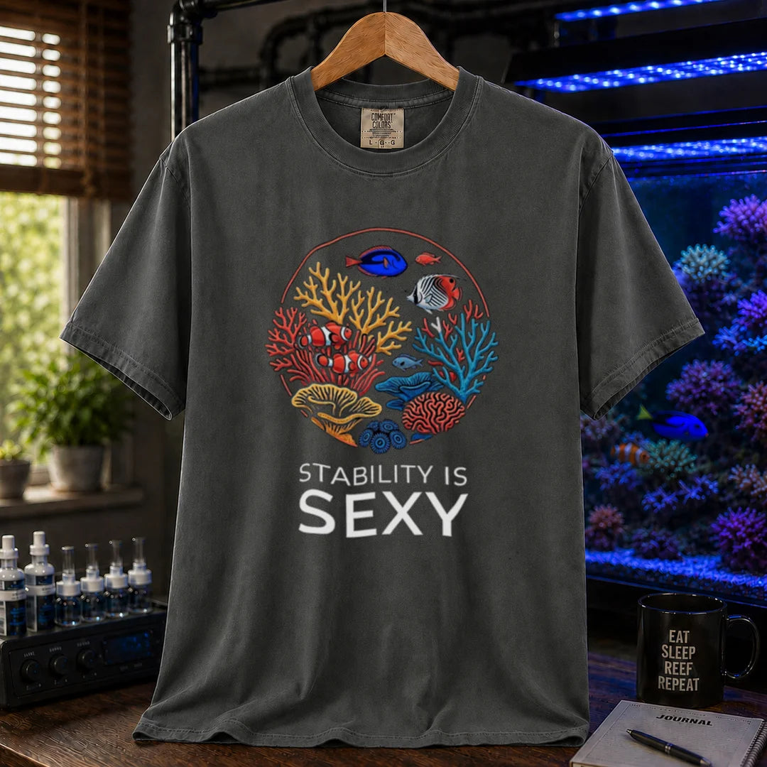 Saltwater aquarium graphic t-shirt featuring a circular coral reef illustration and text: STABILITY IS SEXY, dark grey crew neck tee