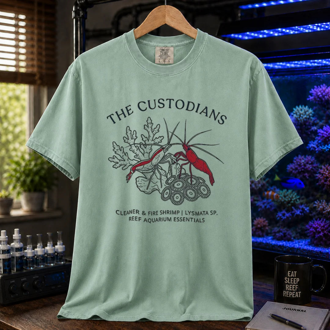Saltwater aquarium graphic t-shirt featuring cleaner and fire shrimp illustrations with text: THE CUSTODIANS CLEANER & FIRE SHRIMP | LYSMATA SP. REEF AQUARIUM ESSENTIALS, green crew neck tee
