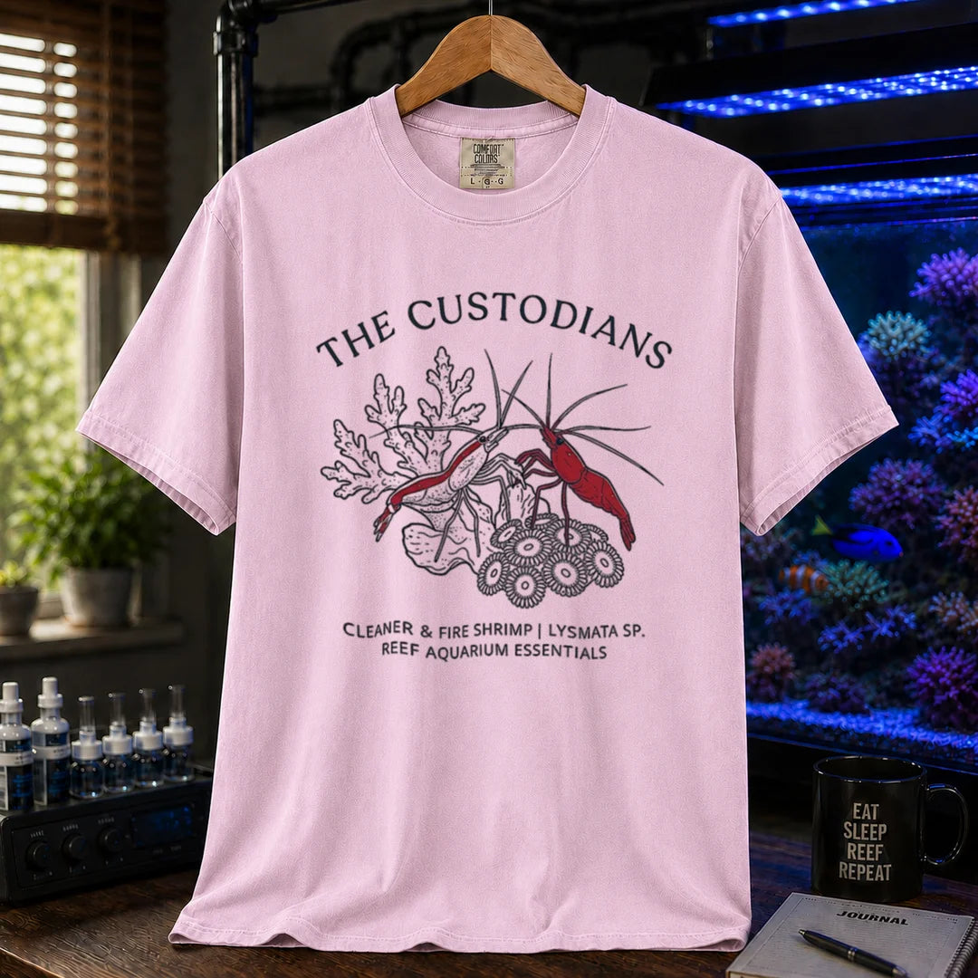 Saltwater aquarium graphic t-shirt featuring cleaner and fire shrimp illustrations with text: THE CUSTODIANS CLEANER & FIRE SHRIMP | LYSMATA SP. REEF AQUARIUM ESSENTIALS, pink crew neck tee
