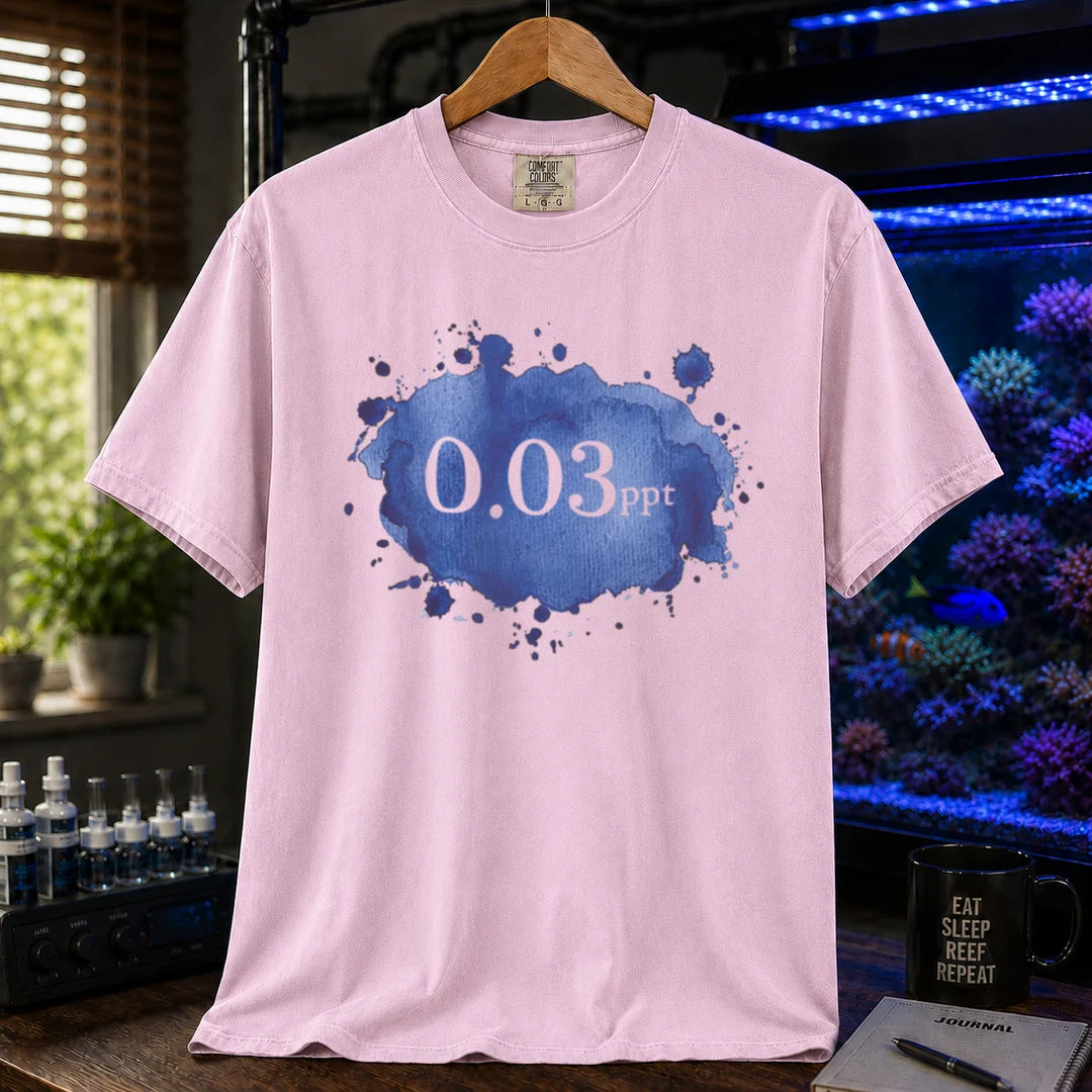 Saltwater aquarium graphic t-shirt featuring a blue watercolor splatter design and text: 0.03 ppt, pink crew neck tee