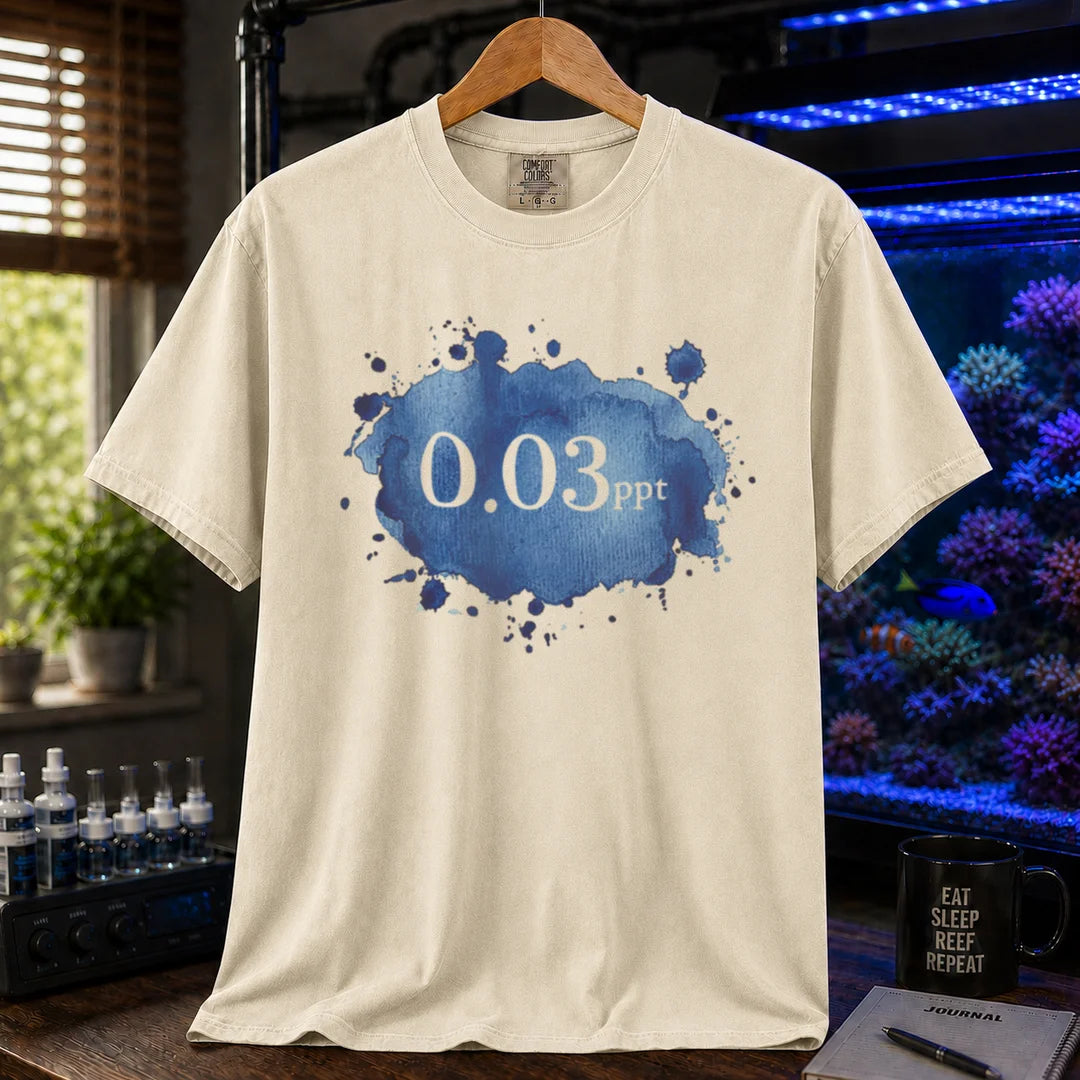 Saltwater aquarium graphic t-shirt featuring a blue watercolor splatter design and text: 0.03 ppt, cream, beige, ivory crew neck tee