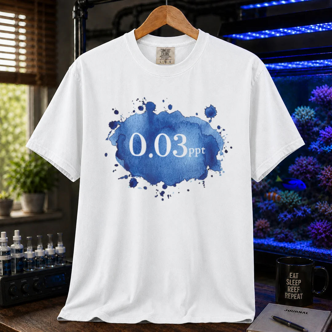Saltwater aquarium graphic t-shirt featuring a blue watercolor splatter design and text: 0.03 ppt, white crew neck tee