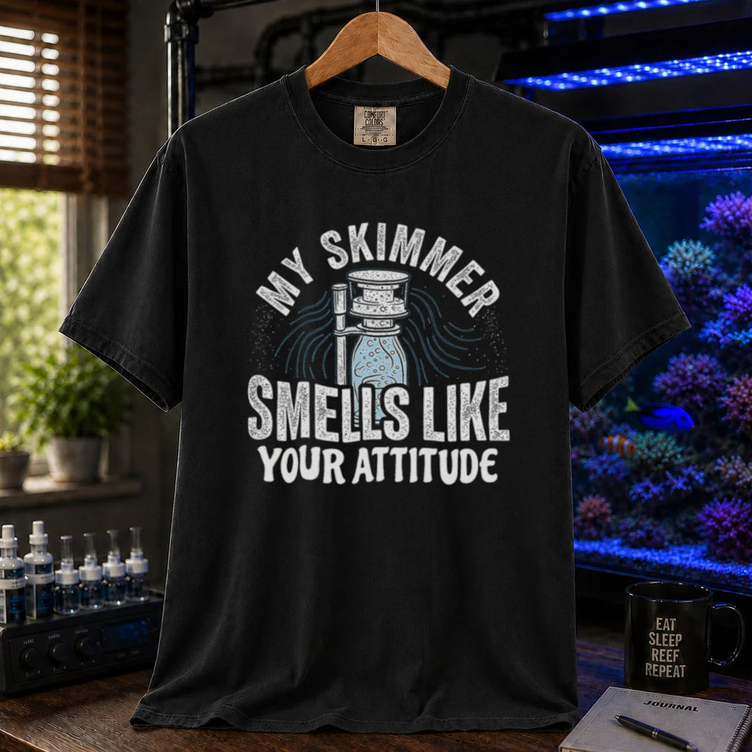 Saltwater aquarium graphic t-shirt featuring a protein skimmer illustration and text: MY SKIMMER SMELLS LIKE YOUR ATTITUDE, black crew neck tee