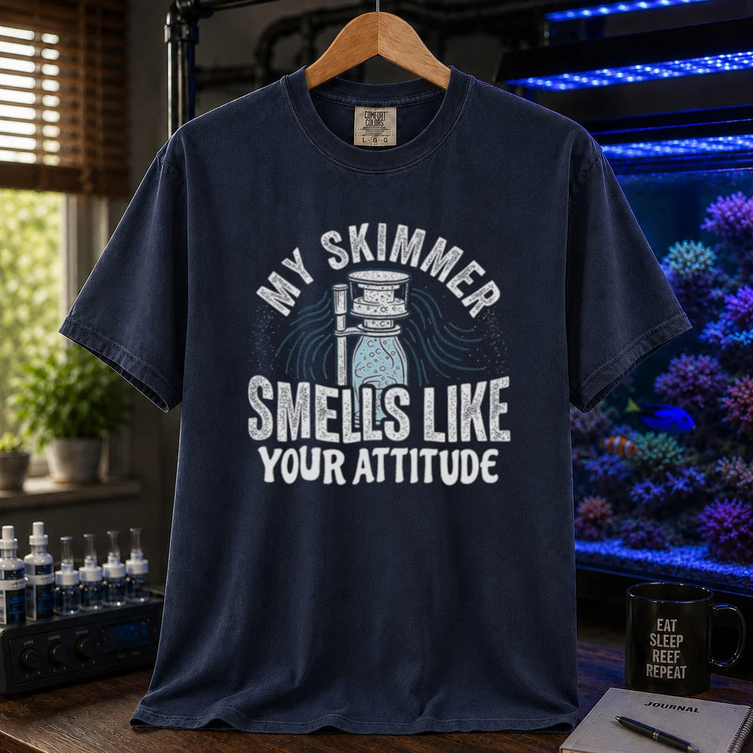 Saltwater aquarium graphic t-shirt featuring a protein skimmer illustration and text: MY SKIMMER SMELLS LIKE YOUR ATTITUDE, navy crew neck tee