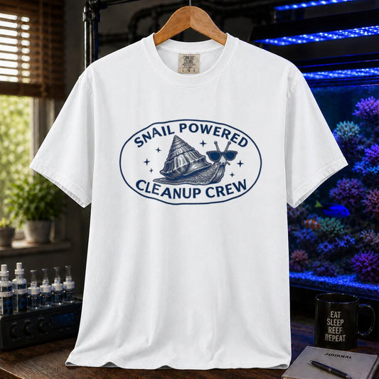 Saltwater aquarium graphic t-shirt featuring an oval emblem of a snail in sunglasses and text: SNAIL POWERED CLEANUP CREW, white crew neck tee