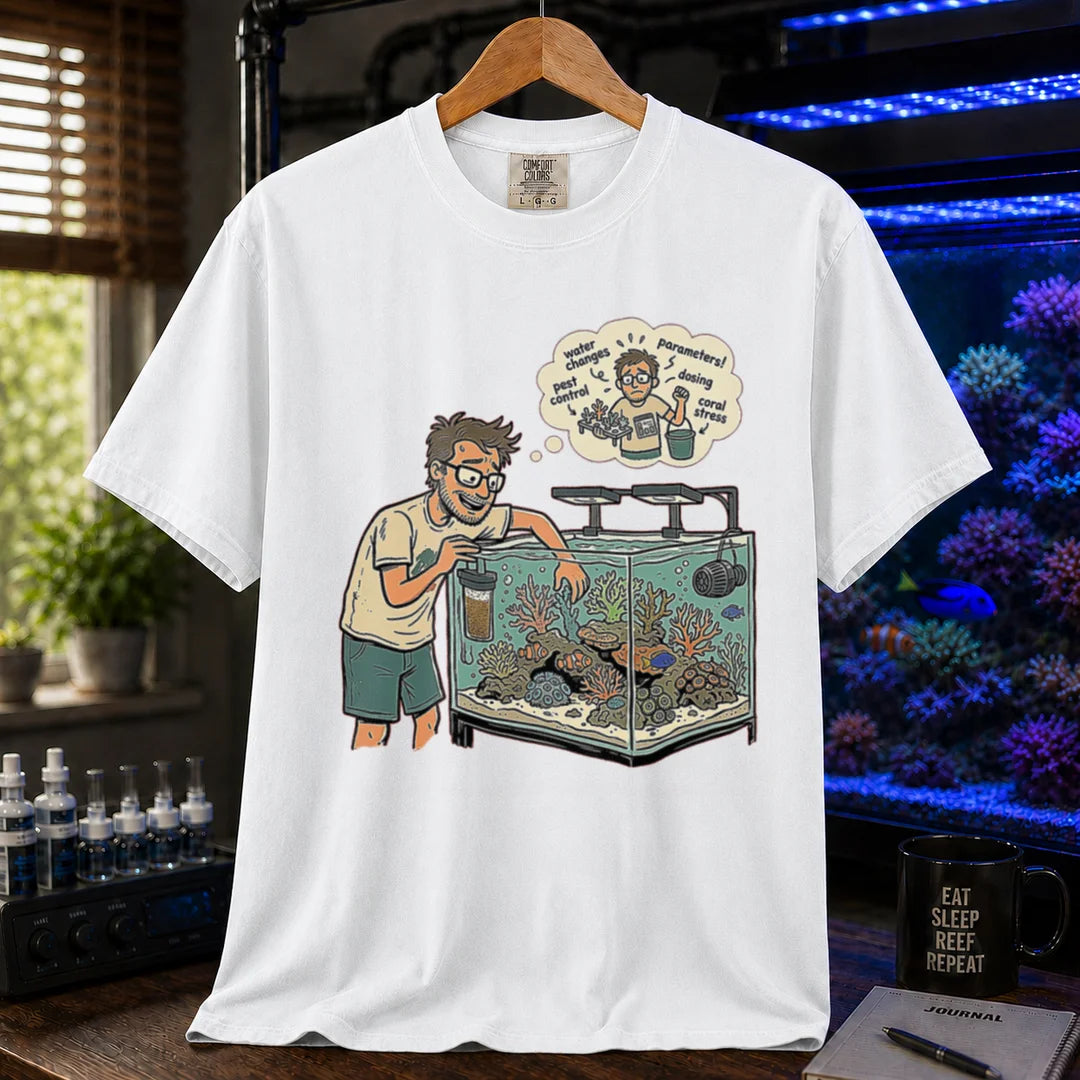 Saltwater aquarium graphic t-shirt featuring an aquarist maintaining a tank with a thought bubble of reef chores, white crew neck tee