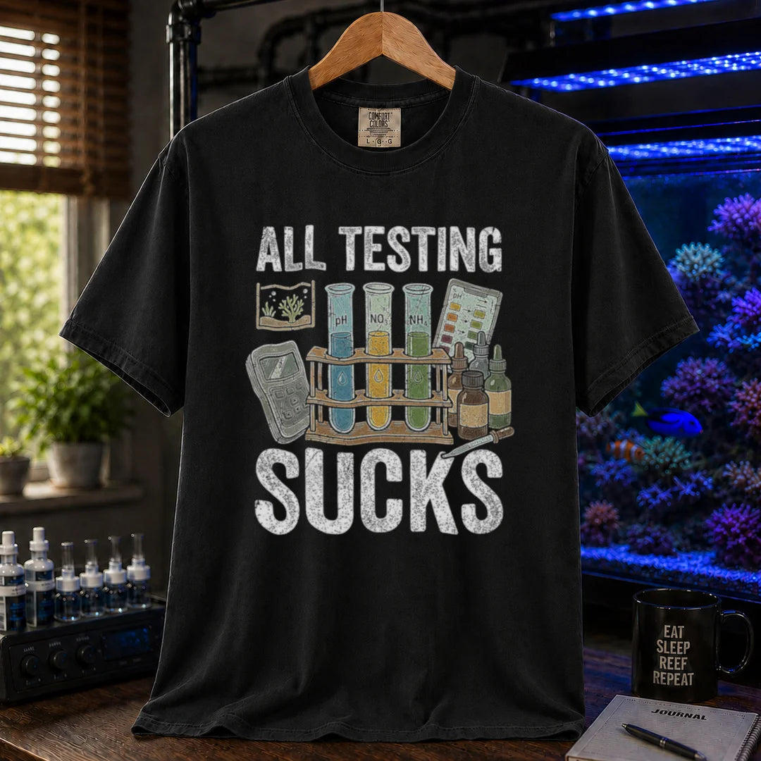 Saltwater aquarium graphic t-shirt featuring test tubes, reagent bottles, and text: ALL TESTING SUCKS, black crew neck tee