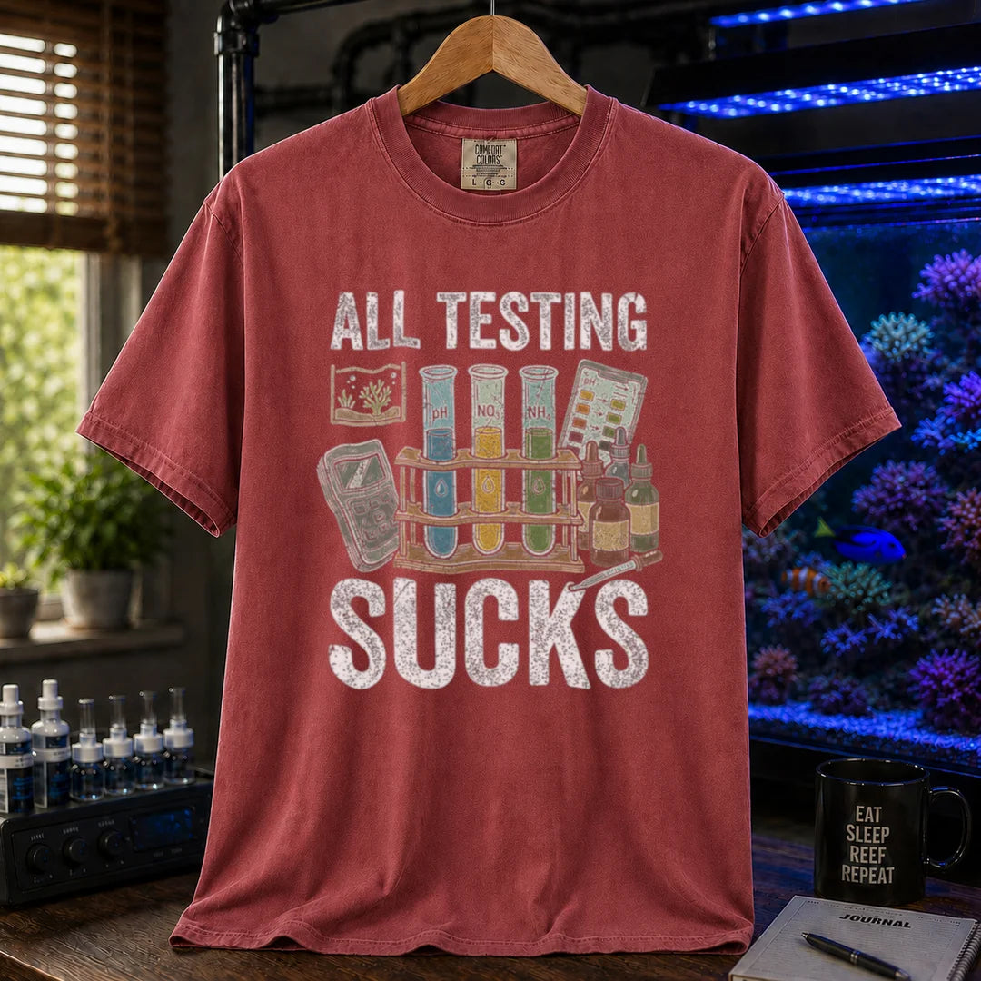 Saltwater aquarium graphic t-shirt featuring test tubes, reagent bottles, and text: ALL TESTING SUCKS, maroon, red crew neck tee